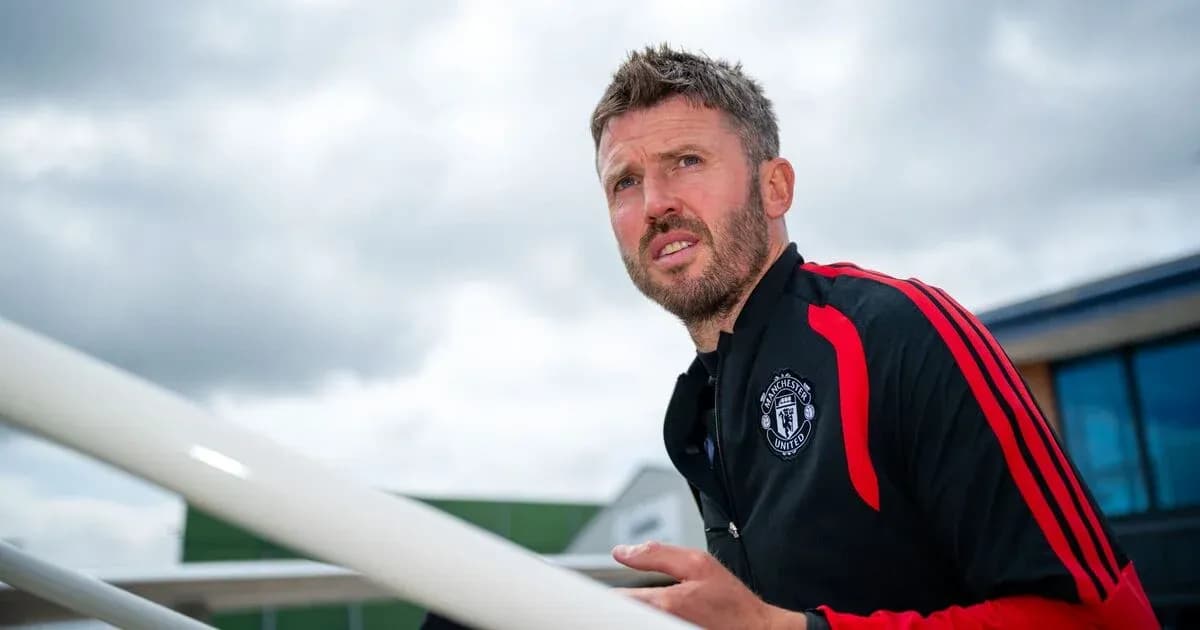 Coach walking up stairs at training facility