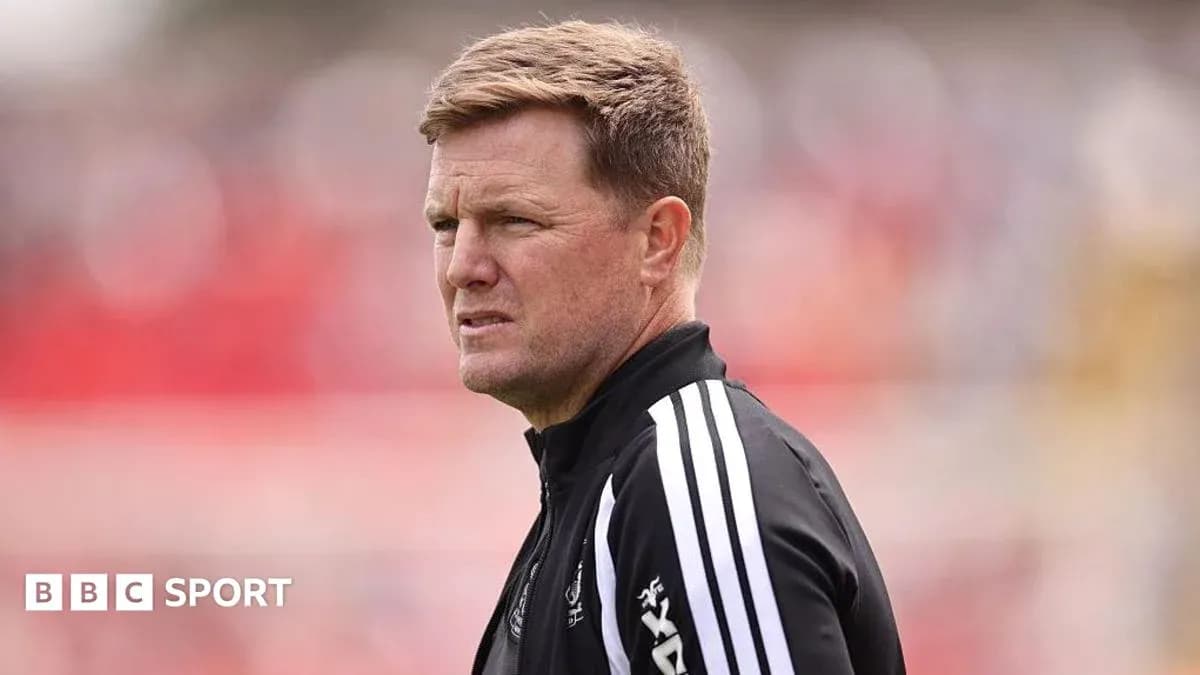 Coach observing the match from the sidelines