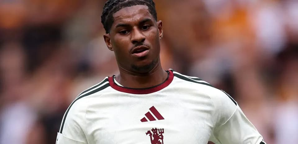 Player in white jersey during match action