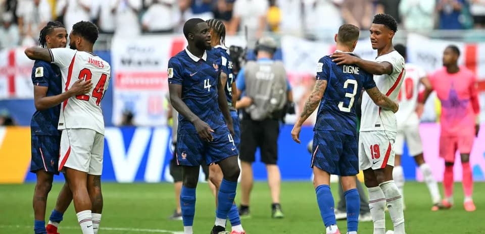 Players from France and England exchanging greetings post-match