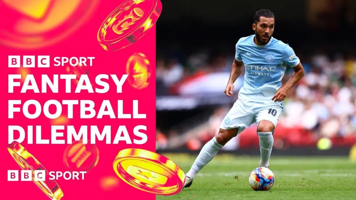 Player dribbling with ball during football match