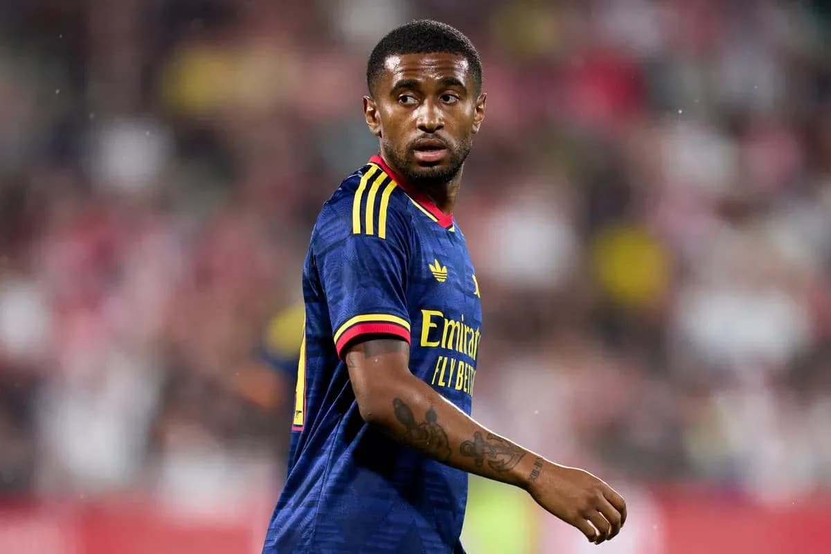 Player in Arsenal kit during match action