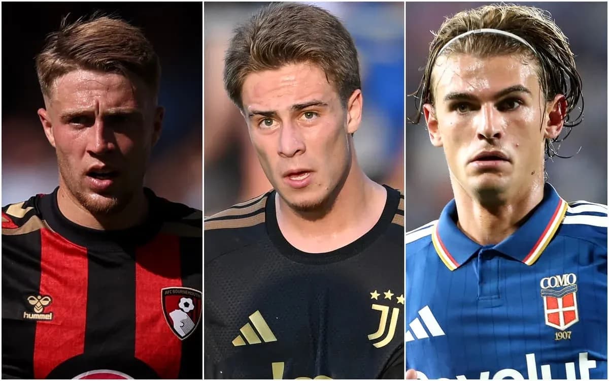 Three football players in their team jerseys