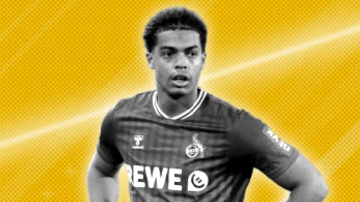 Player wearing REWE jersey against yellow background