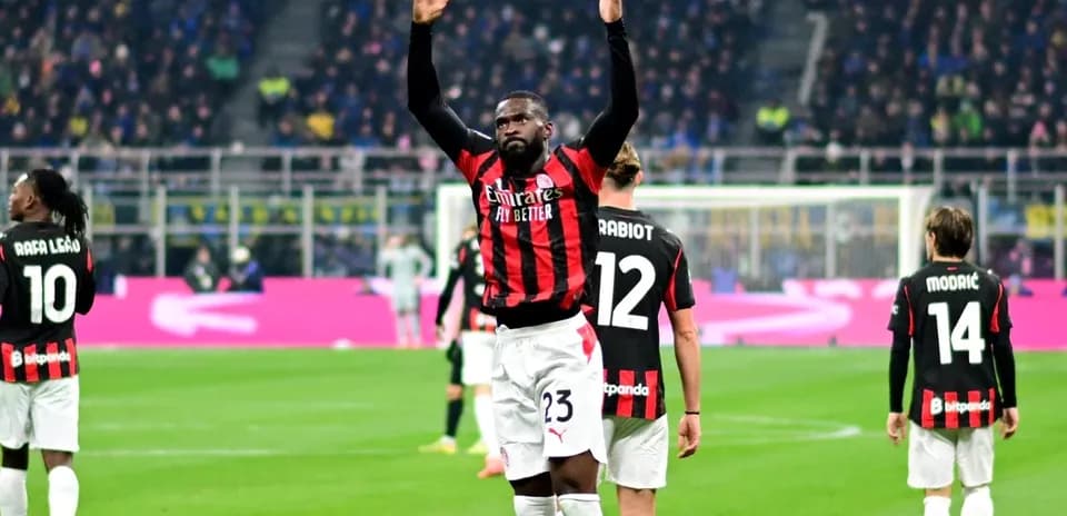 AC Milan players celebrating on the field