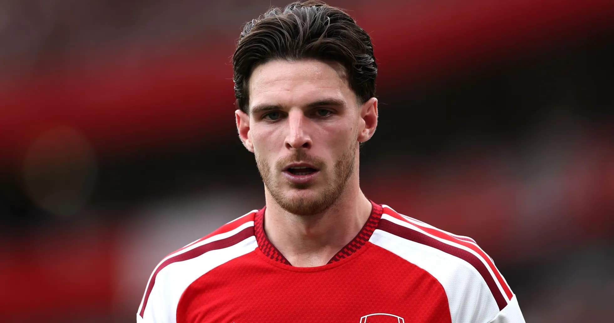 Player in Arsenal jersey during match close-up