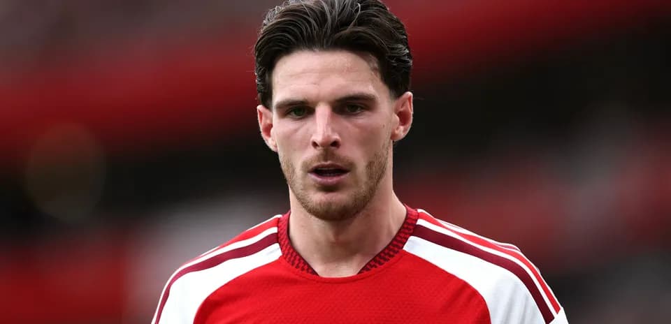 Player in Arsenal jersey during match close-up