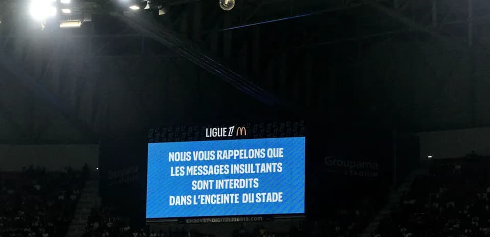 Screen displaying warning about prohibited messages at stadium