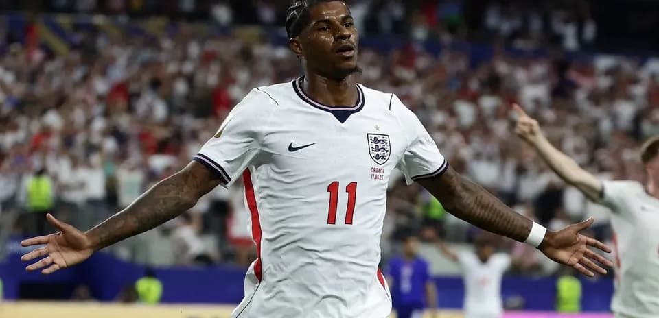 Player celebrating after scoring for England during match