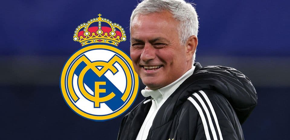 Jose Mourinho smiling with Real Madrid logo behind