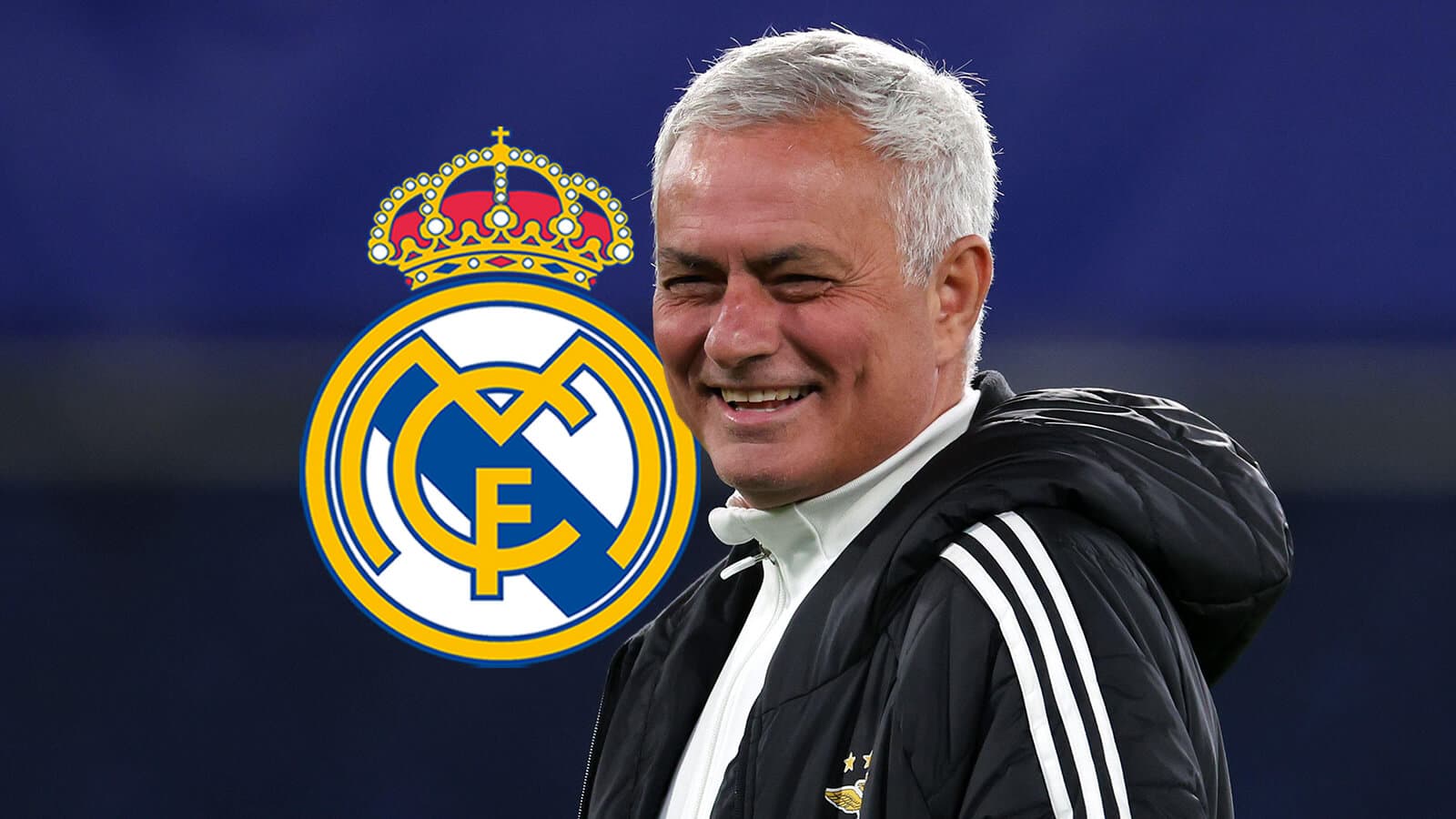 Jose Mourinho smiling with Real Madrid logo behind