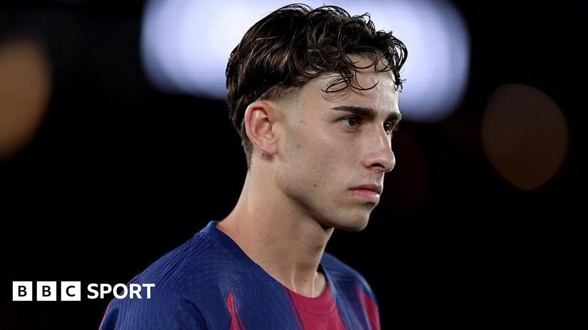 Player in FC Barcelona jersey during match