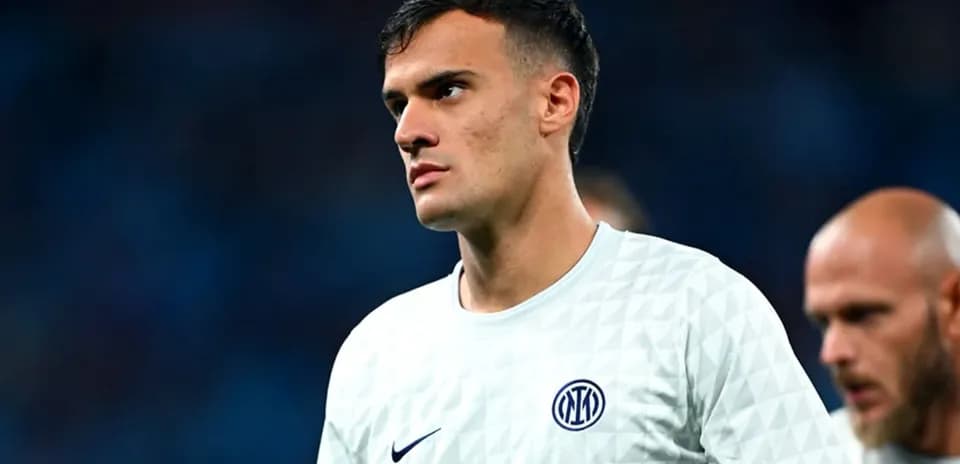 Player in Inter Milan kit during match warm-up