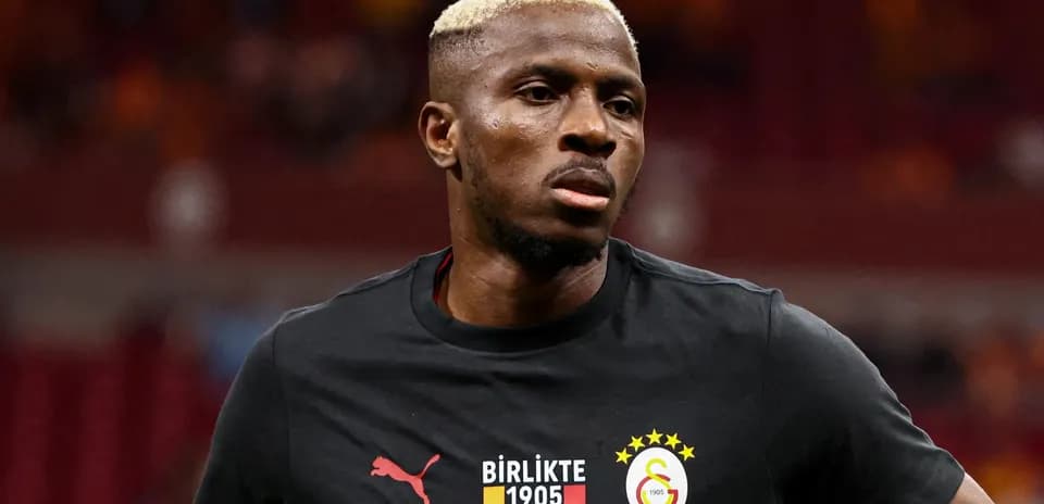 Player in Galatasaray warm-up shirt on field