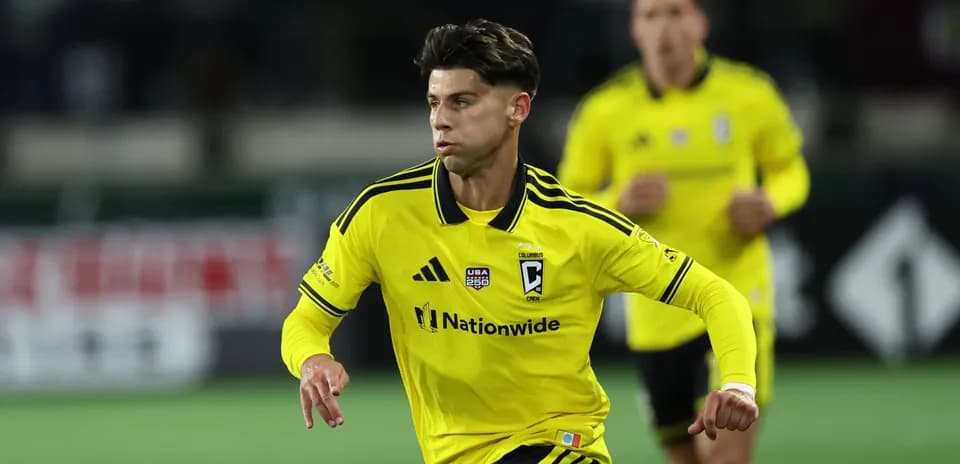 Columbus Crew player in yellow jersey during match