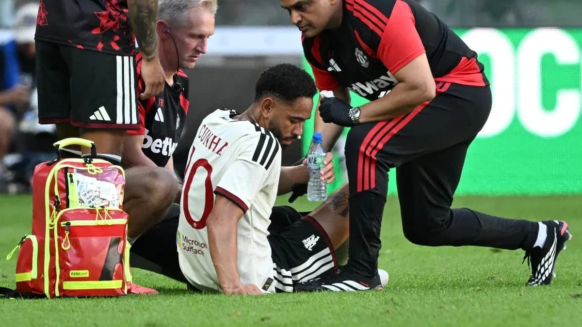 Player receiving medical attention on the field
