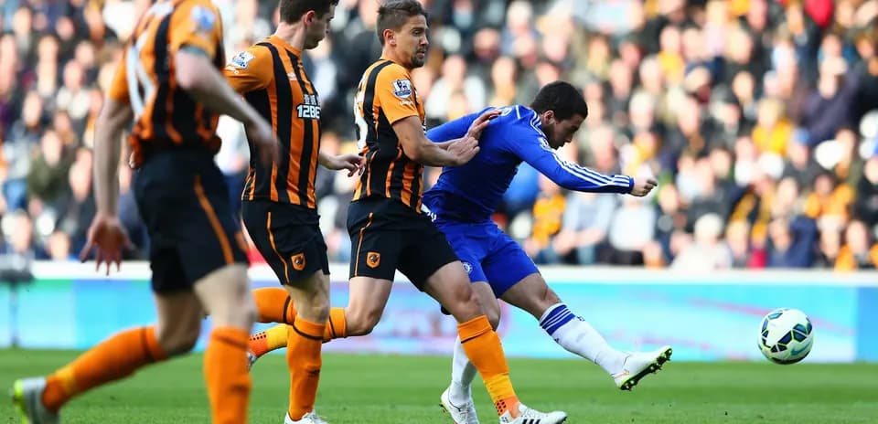 Chelsea player kicking ball against Hull City