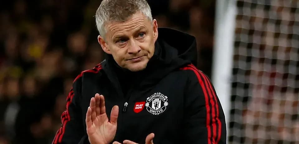 Manager applauding during a match at the stadium