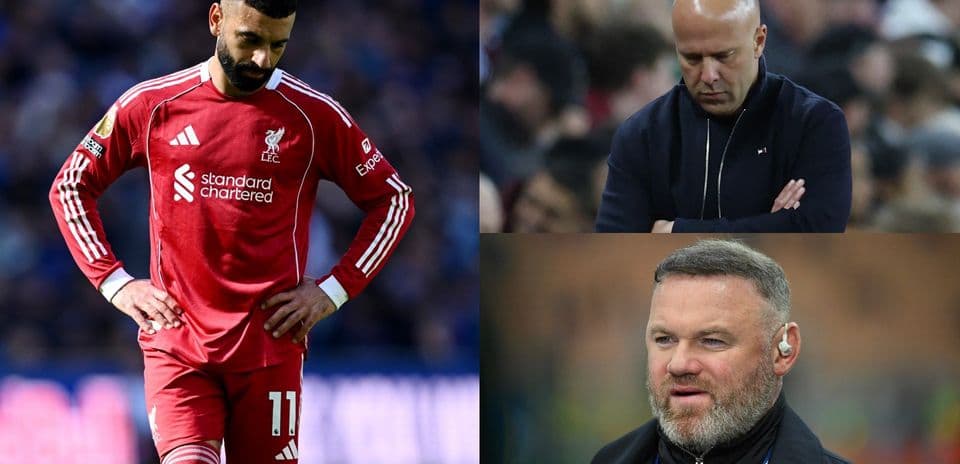Liverpool player looking dejected, two coaches observing