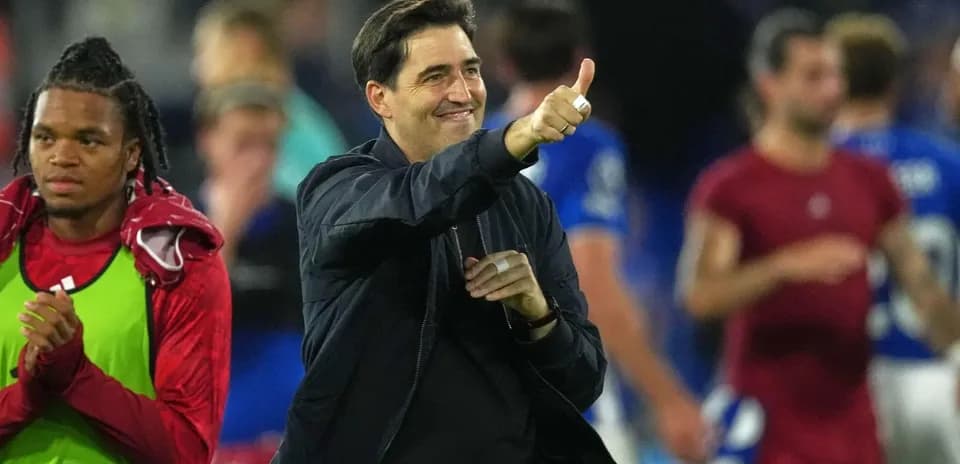 Coach giving a thumbs up after the match