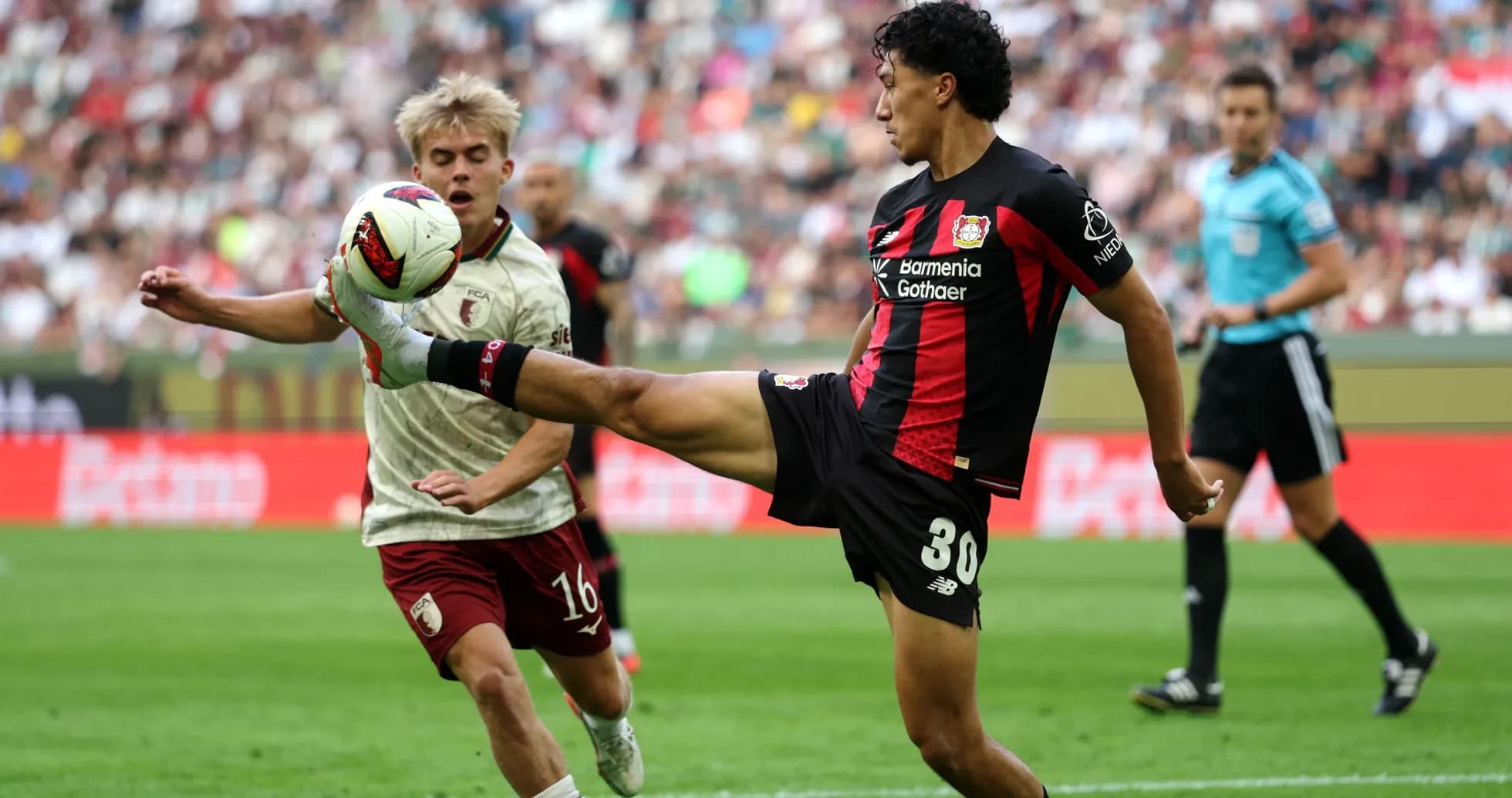 Player kicking the ball during a football match