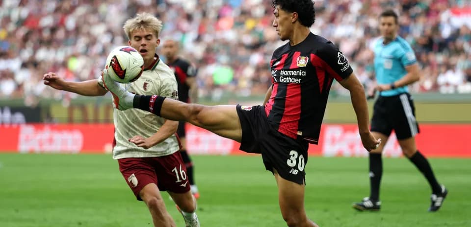 Player kicking the ball during a football match
