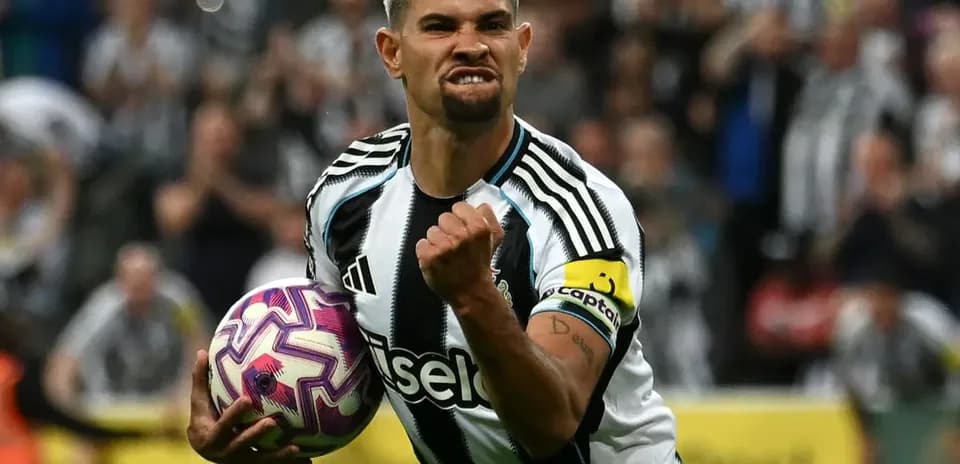 Player celebrating with ball during match