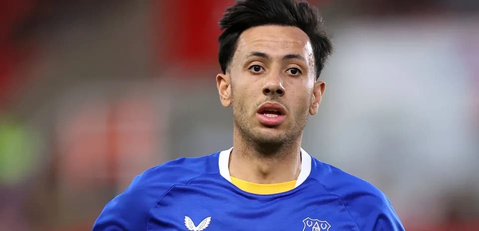 Player wearing Everton jersey during match action