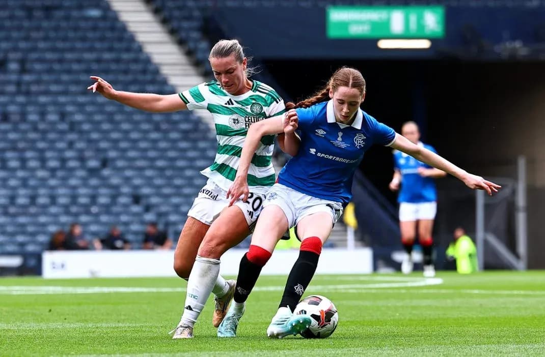 Two players competing for the ball during match