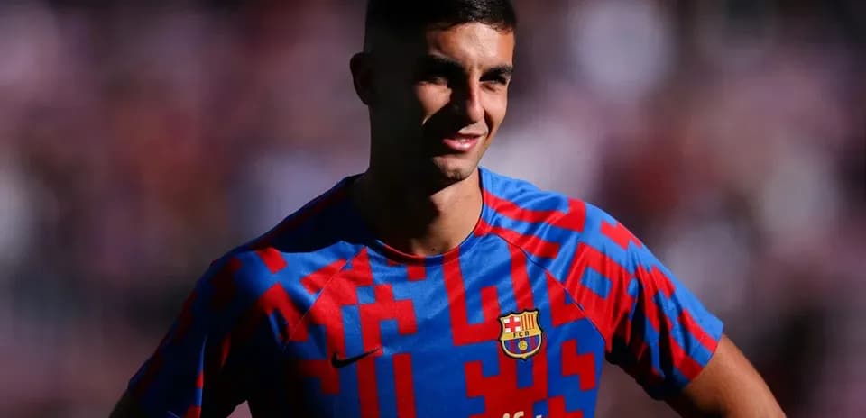 Player posing in Barcelona kit during event