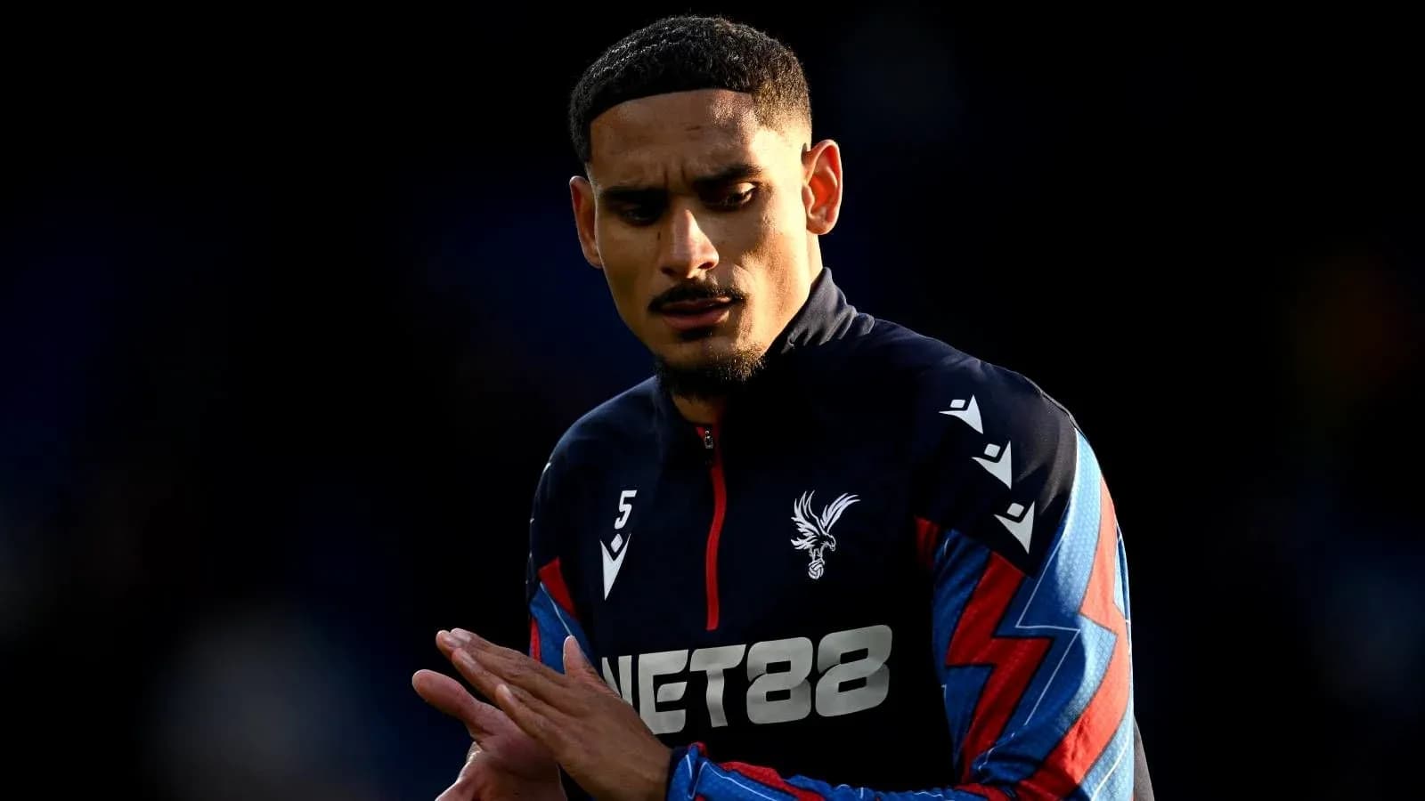 Player in Crystal Palace training kit during warm-up