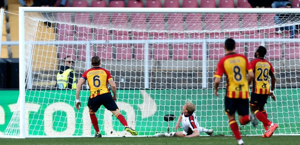Goalkeeper saves penalty during Lecce vs Genoa match
