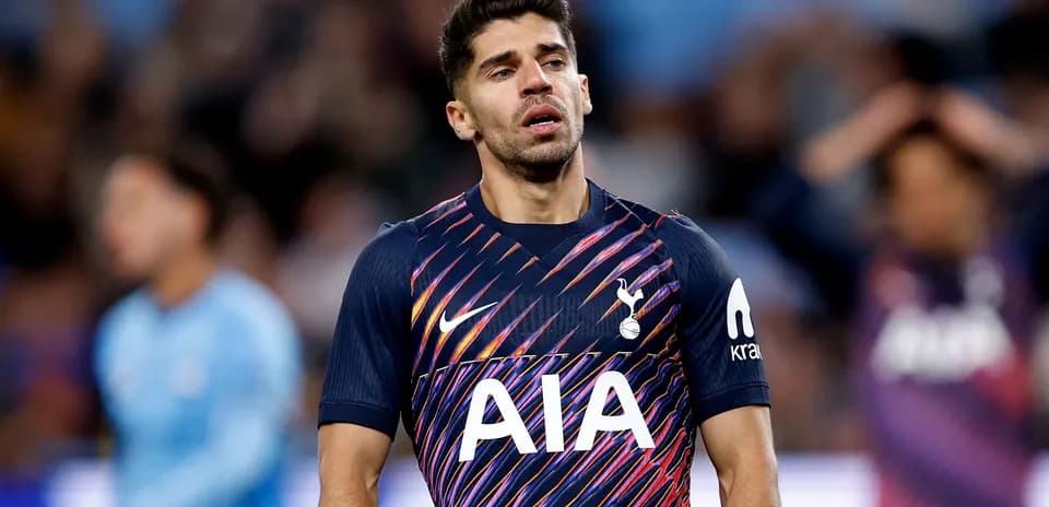 Player wearing Tottenham jersey during a match