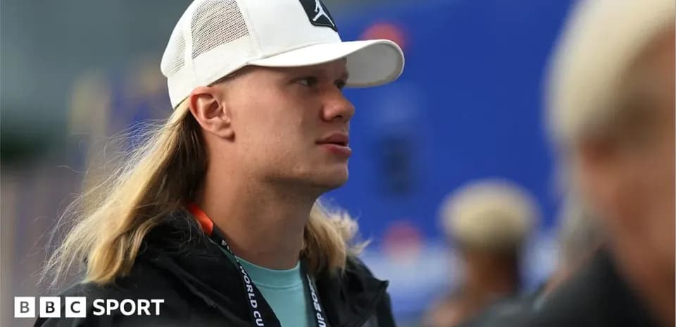 Person wearing a cap at an event venue