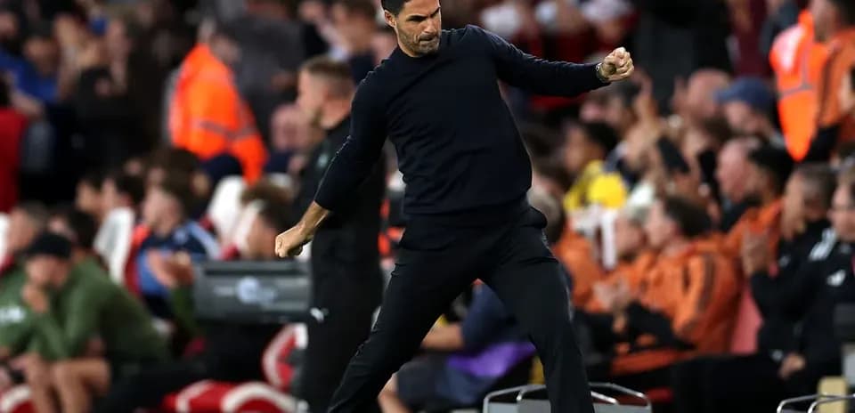 Manager celebrating during a football match