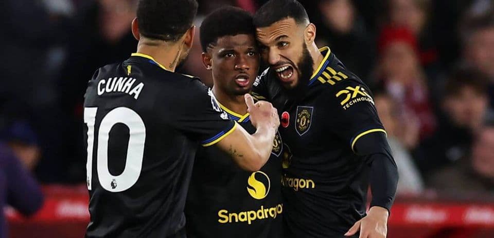 Manchester United players celebrating a goal