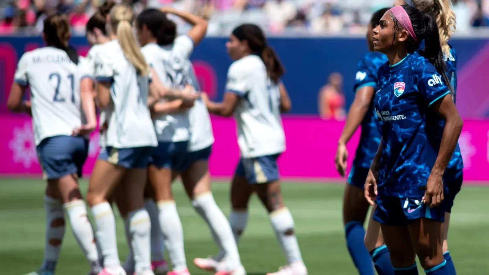 Players celebrating during Seattle Reign vs San Diego Wave match