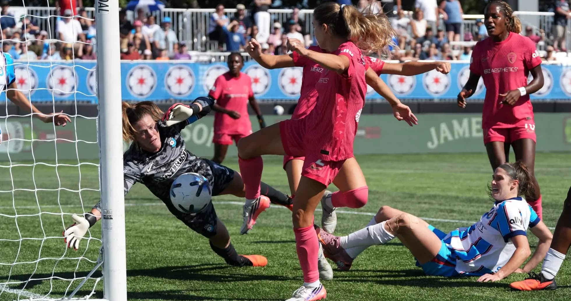 Goalkeeper saving a shot during match action