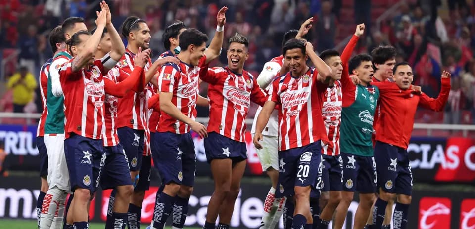 Chivas celebrating victory in Liga MX match