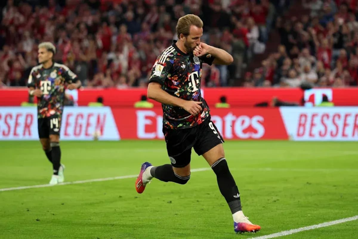 Player celebrating a goal in colorful jersey