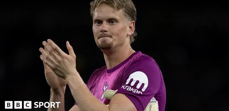 Goalkeeper applauding fans after match