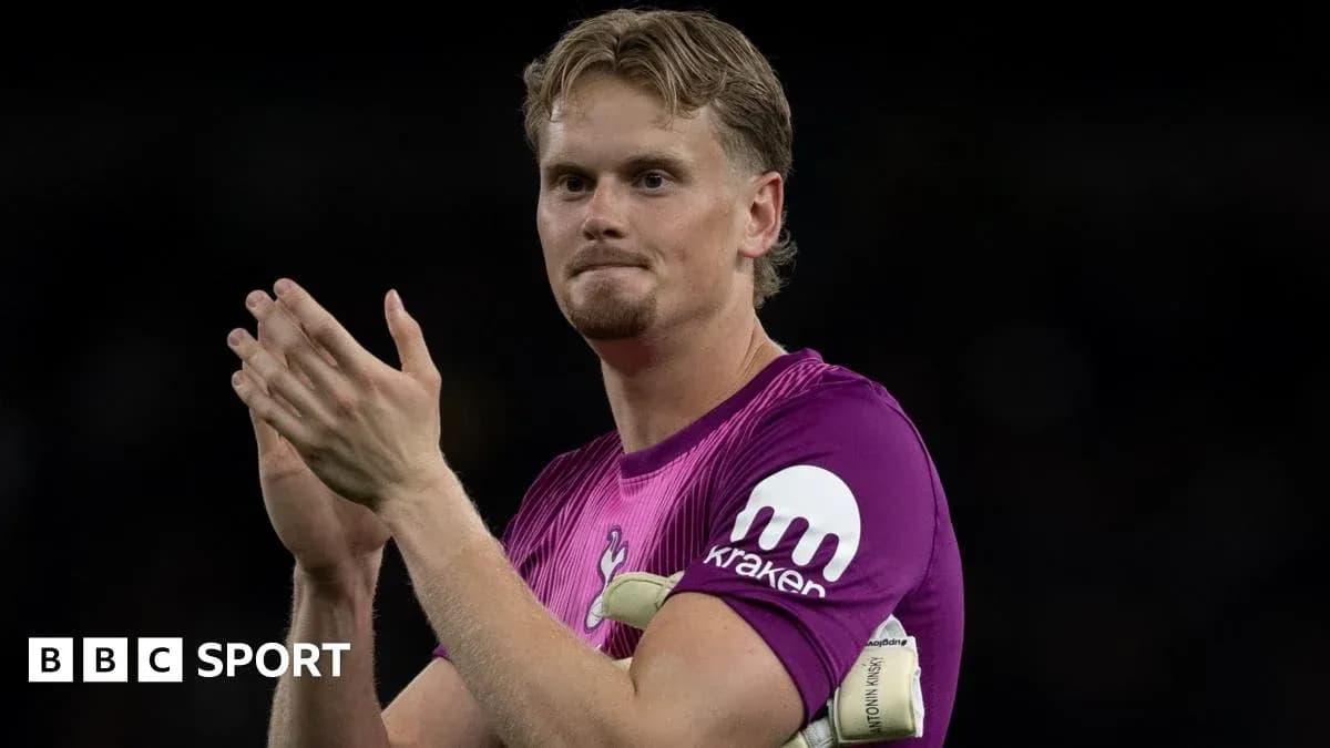 Goalkeeper applauding fans after match