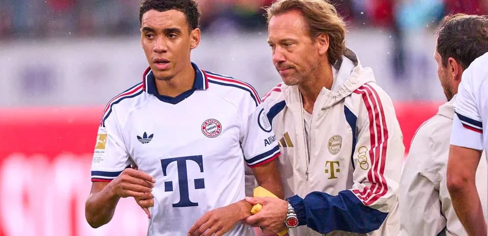 Player receiving assistance from staff during match