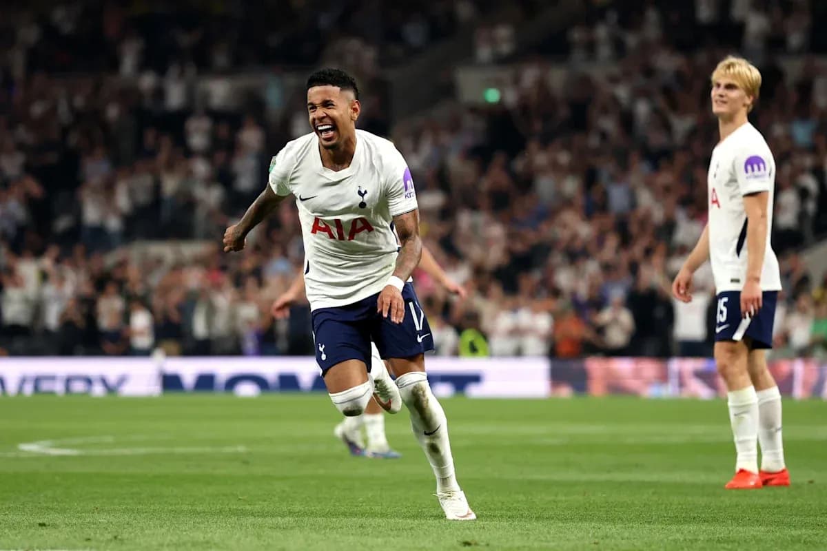 Tottenham player celebrating a goal on the pitch