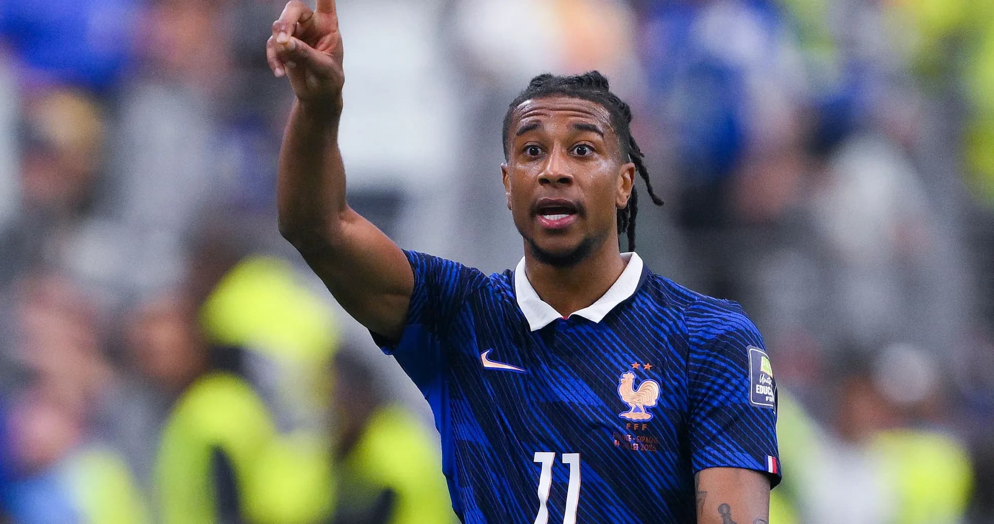 Player gesturing during match for France team