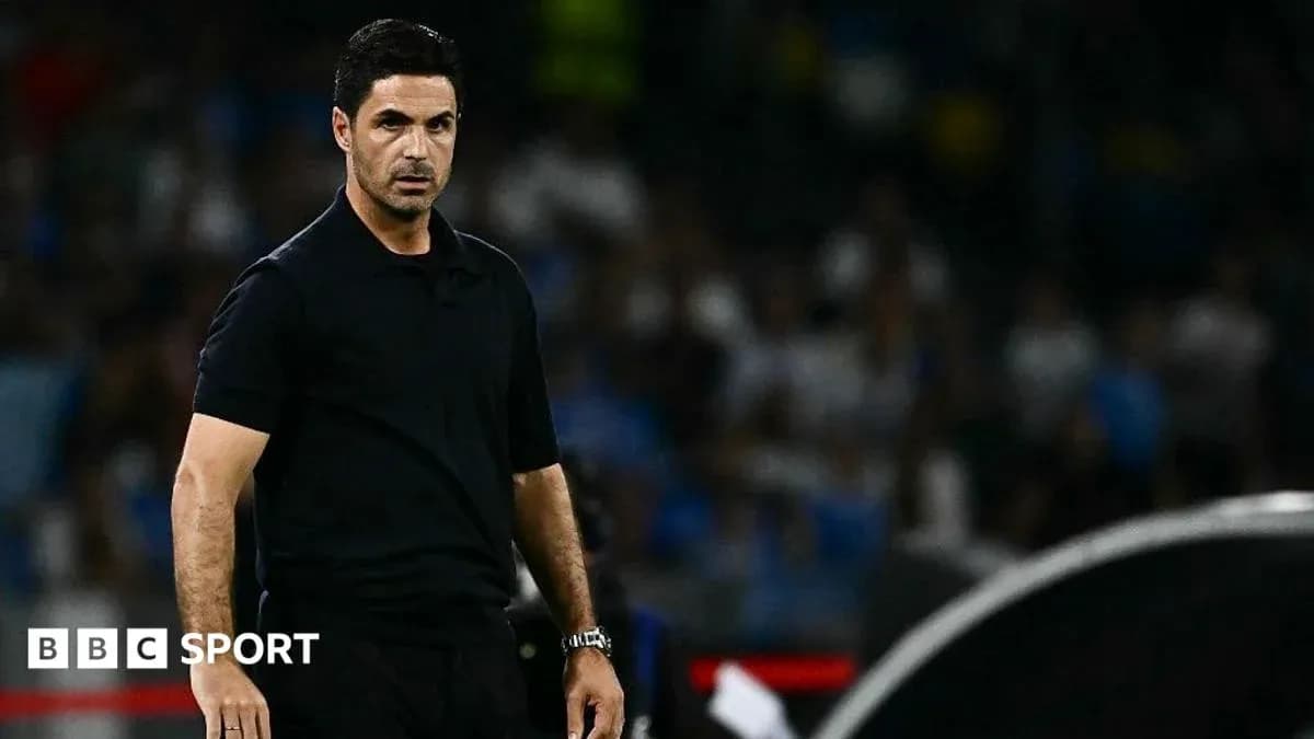 Coach observing the match from the sidelines
