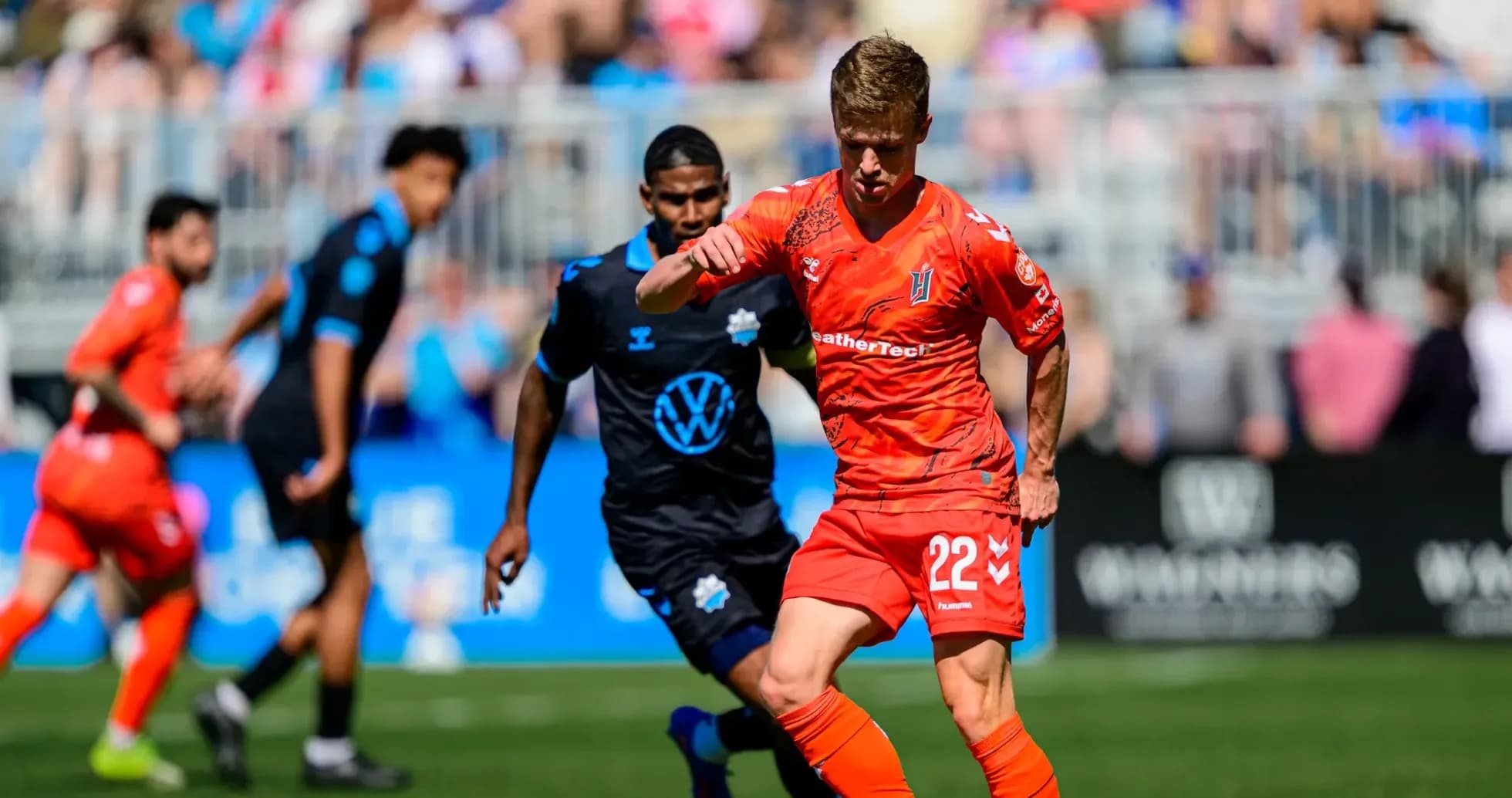 Player dribbling the ball during match