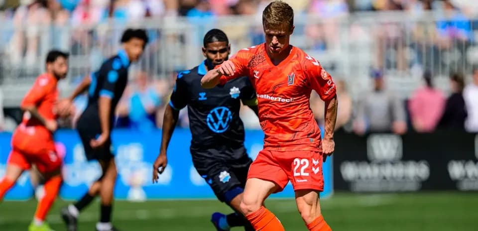 Player dribbling the ball during match