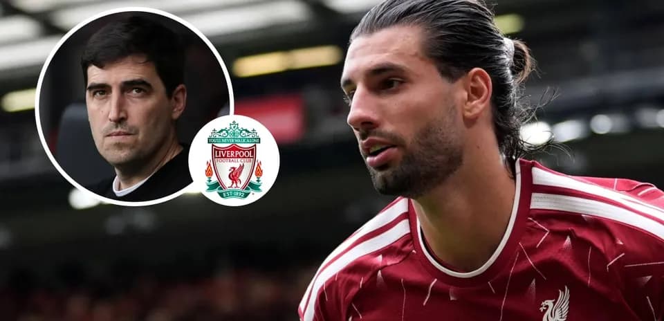 Liverpool player in red kit with club logo