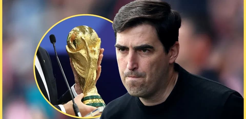 Coach looking at FIFA World Cup trophy presentation